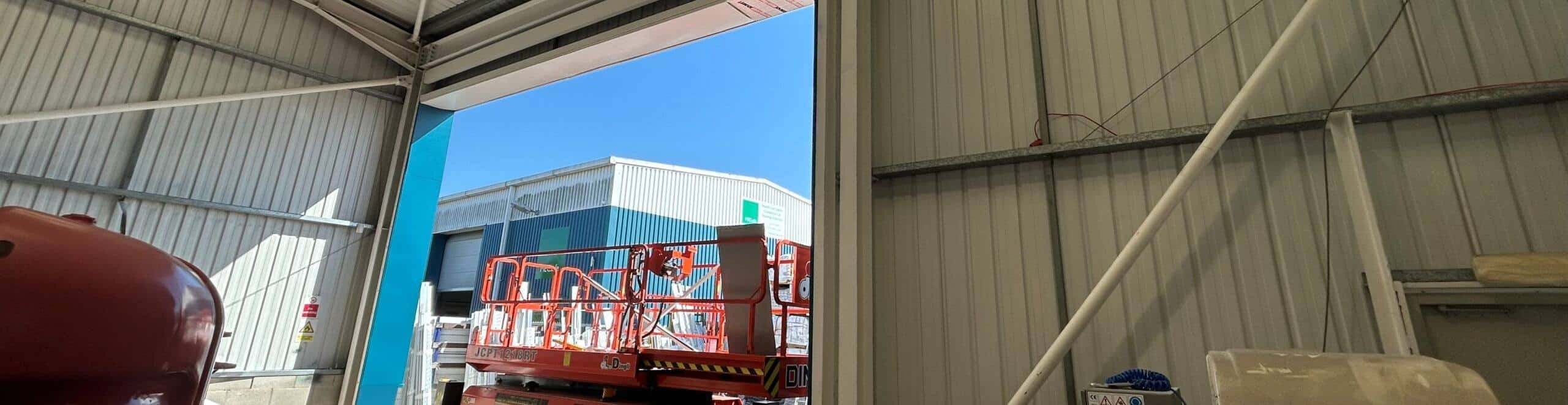 Interior of Rapid PVCU Systems warehouse showing the widened 7m door opening